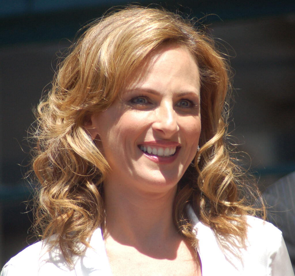 Portrait of Deaf actress Marlee Matlin smiling at a public event, known for winning the Academy Award for Best Actress for Children of a Lesser God.