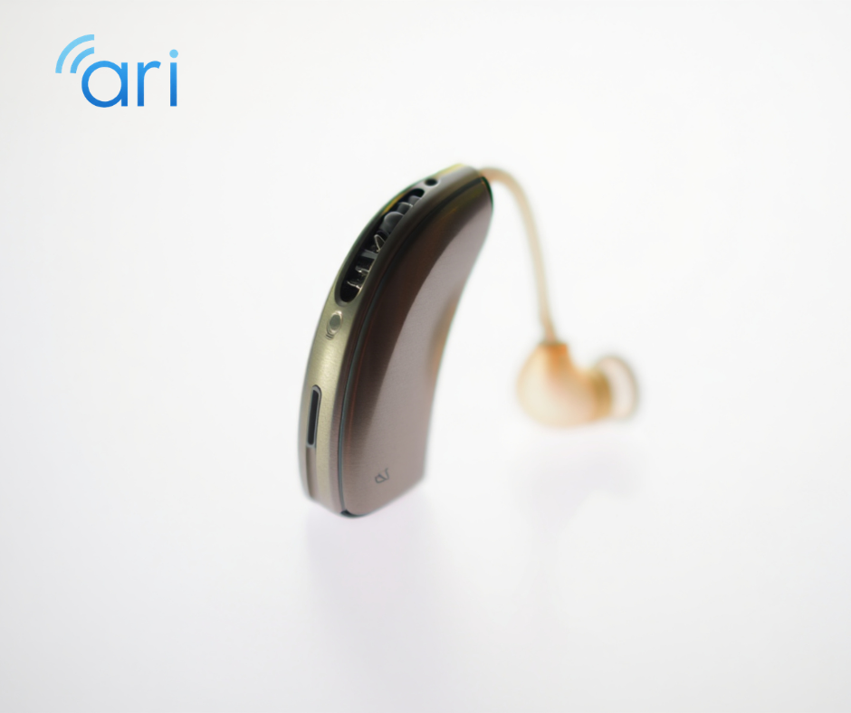 Behind the ear digital hearing aid with ear mold used for treating mild to moderate hearing loss.