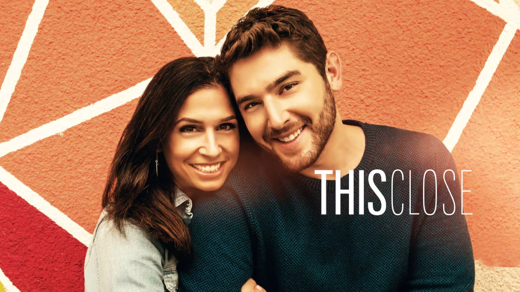 Promotional image for the TV series This Close featuring two Deaf adults communicating and interacting in an urban setting.