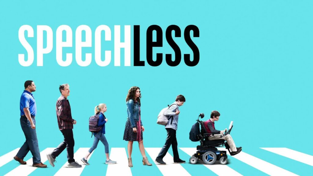 Promotional image for the TV show Speechless featuring a family walking across a crosswalk, including a teenage boy with cerebral palsy using a wheelchair communication device.